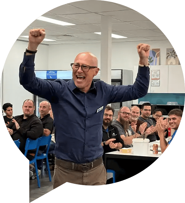 Office Solutions IT Founder and Director James Sutherland celebrating with the team in the Perth office