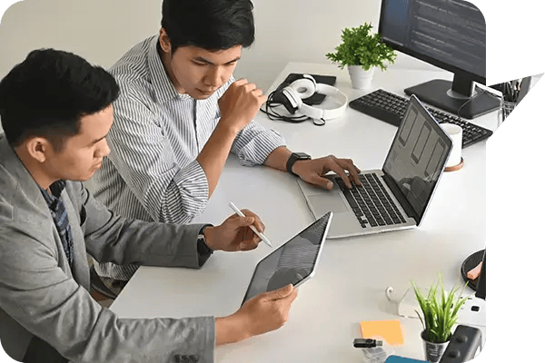 Team members utlising the Microsoft 365 Copilot features