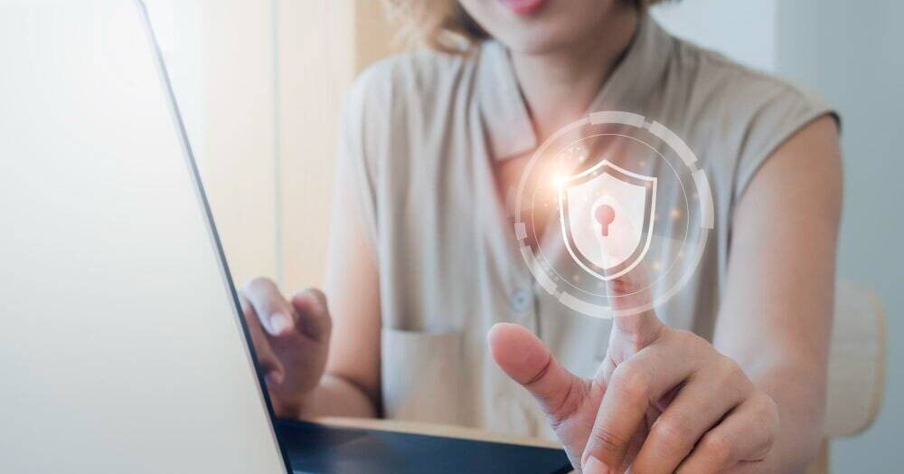 woman implementing cyber insurance into her business