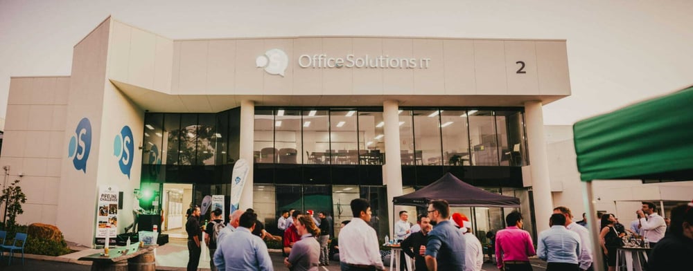 Office Solutions IT Perth HQ building front with teams and clients