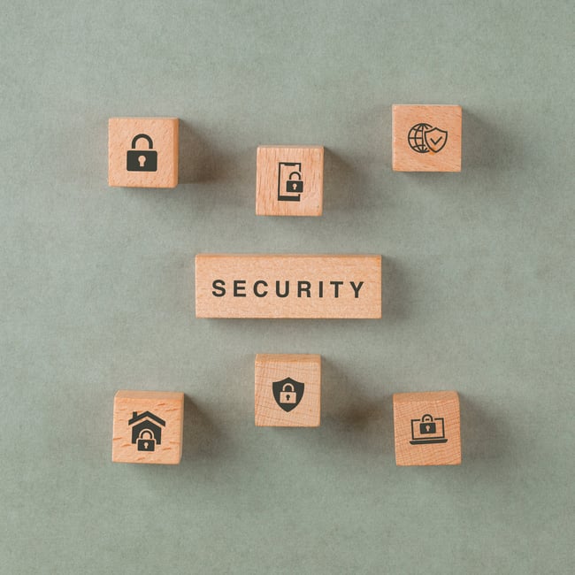 security-concept-with-wooden-blocks-with-icons-min