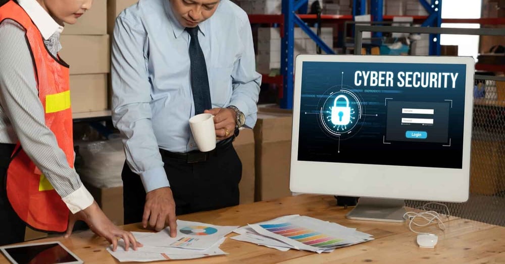 man and woman having a meeting about the cyber security in their perth company