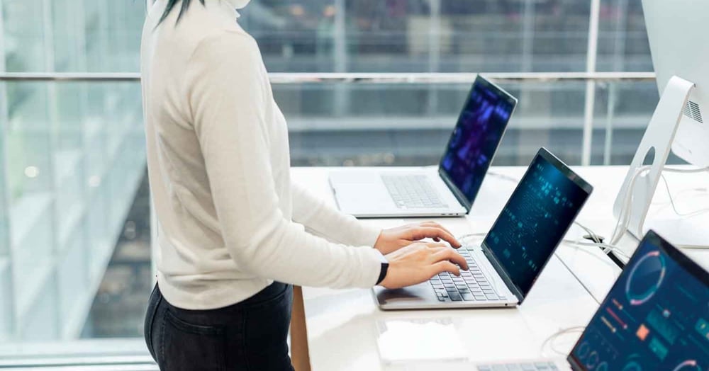 woman working on implementing cyber security in a perth business