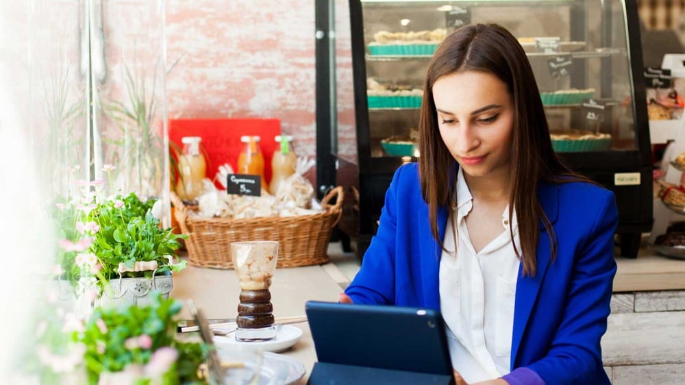 Woman using IT services for her Perth business
