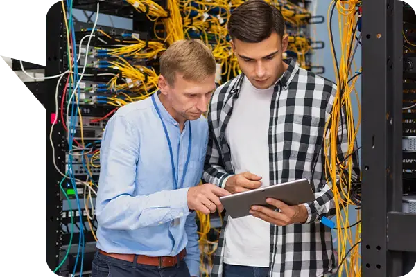 IT engineers setting up managed internet services